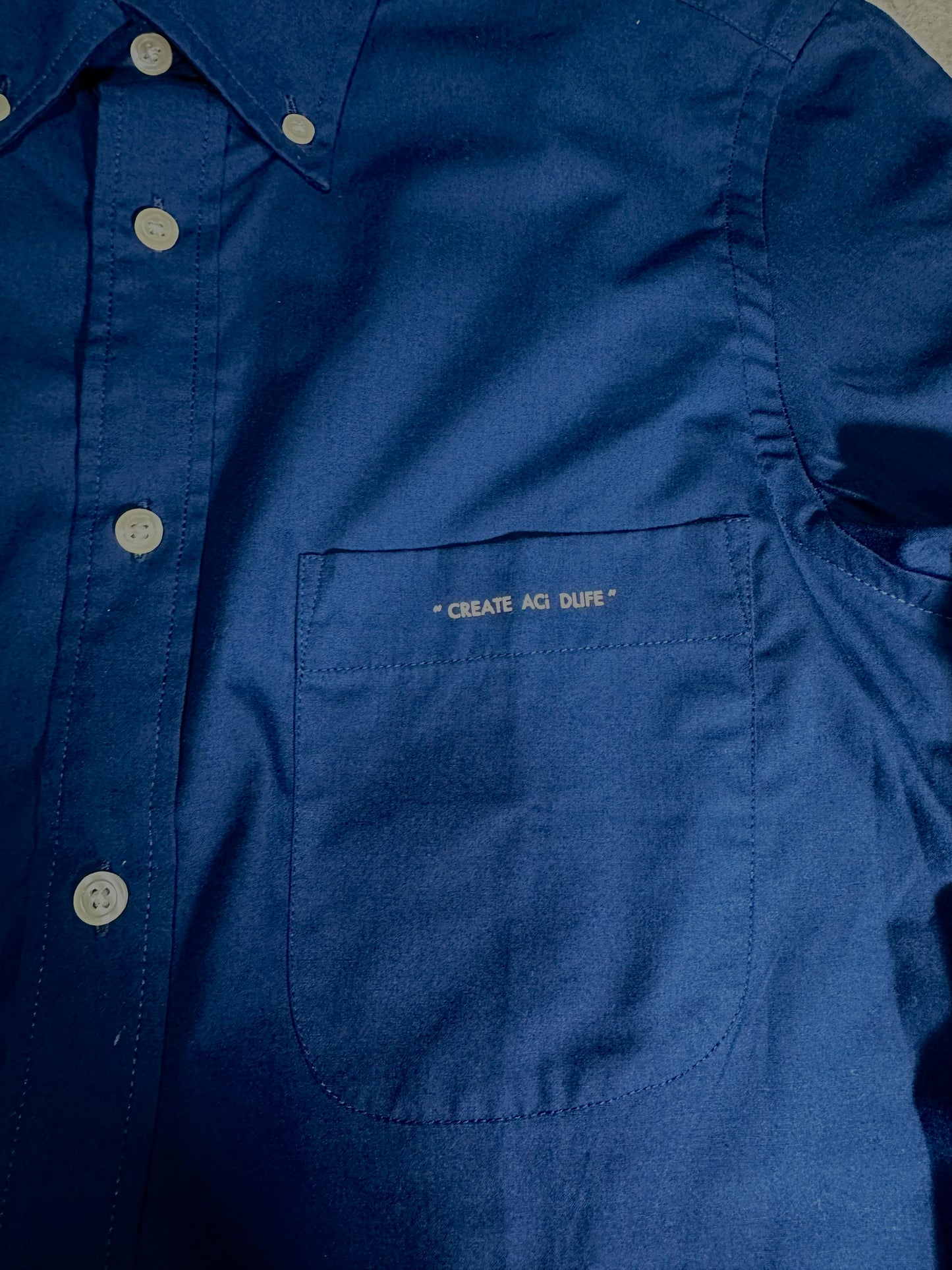 navy button down shirt