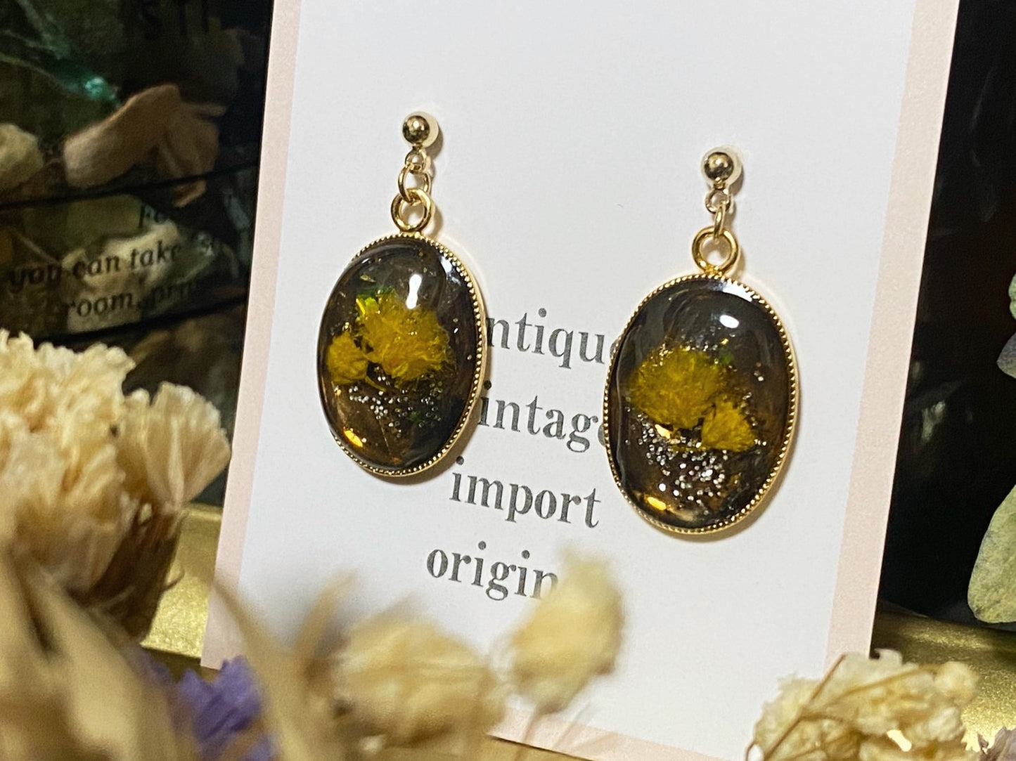 yellow flower gold resin pierced earrings
